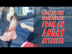 Kick to the groin defense from an angry attacker.